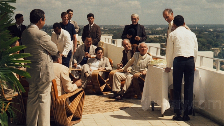 Rattan armchairs in the Godfather Part II - buy similar ones from Harvey's on Beverly